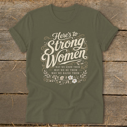 Olive green t-shirt with "Here's to Strong Women" and a floral design.