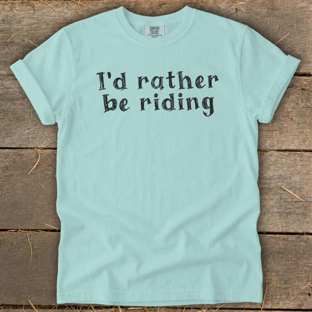 Light blue t-shirt with black text reading "I'd rather be riding".
