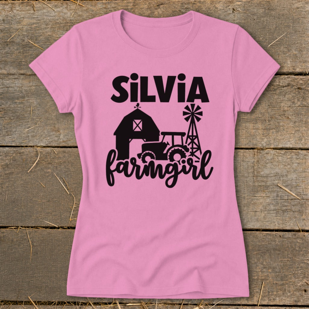 Pink t-shirt with "SiLVIA farmingirl" and farm graphics.