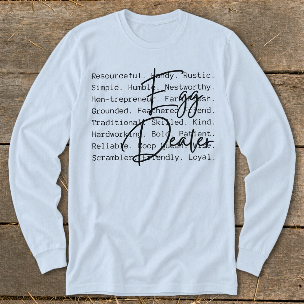 Light blue long-sleeve shirt with "Egg Dealer" and descriptive words in black text.