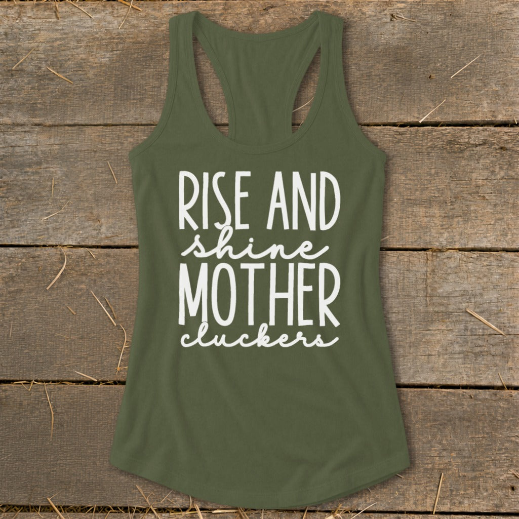 Green tank top with white text reading "RISE AND shine MOTHER cluckers".