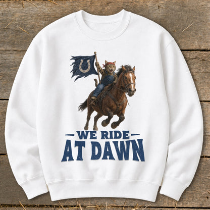 Cat riding a horse with a horseshoe flag and text "We Ride At Dawn".