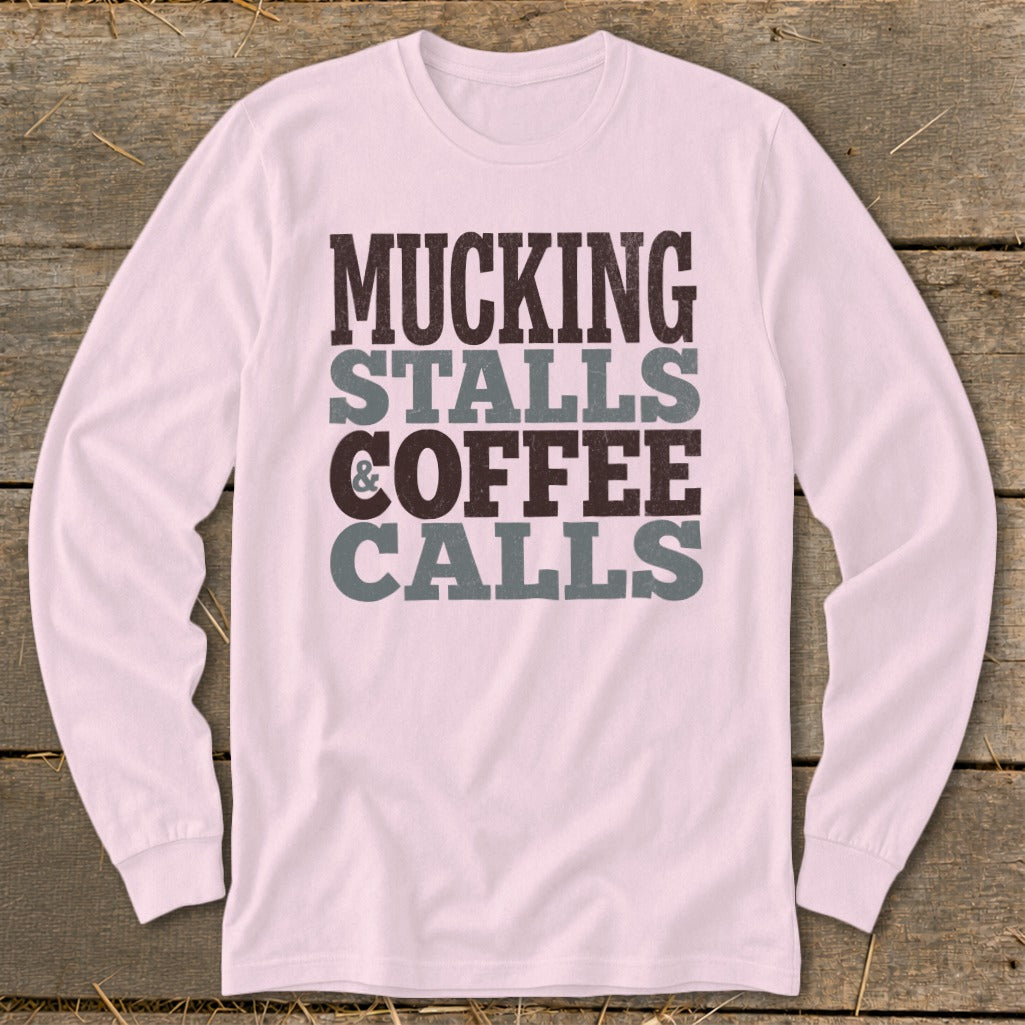 Pink long-sleeve shirt with "Mucking Stalls Coffee Calls" text design.