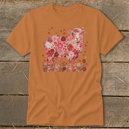 Orange t-shirt with a sheep graphic made of pink and red flowers and hearts.