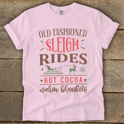Pink t-shirt with text "Old Fashioned Sleigh Rides Hot Cocoa Warm Blankets".