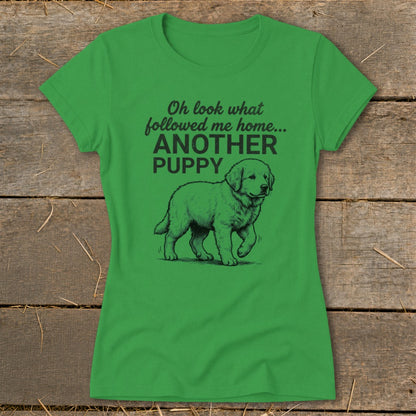 Green t-shirt with black text and a drawing of a puppy.