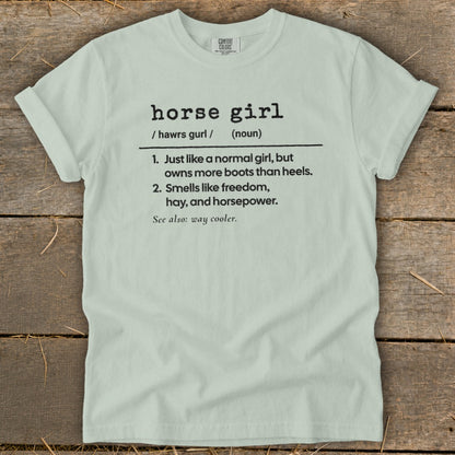 Pale green t-shirt with "horse girl" definition text.