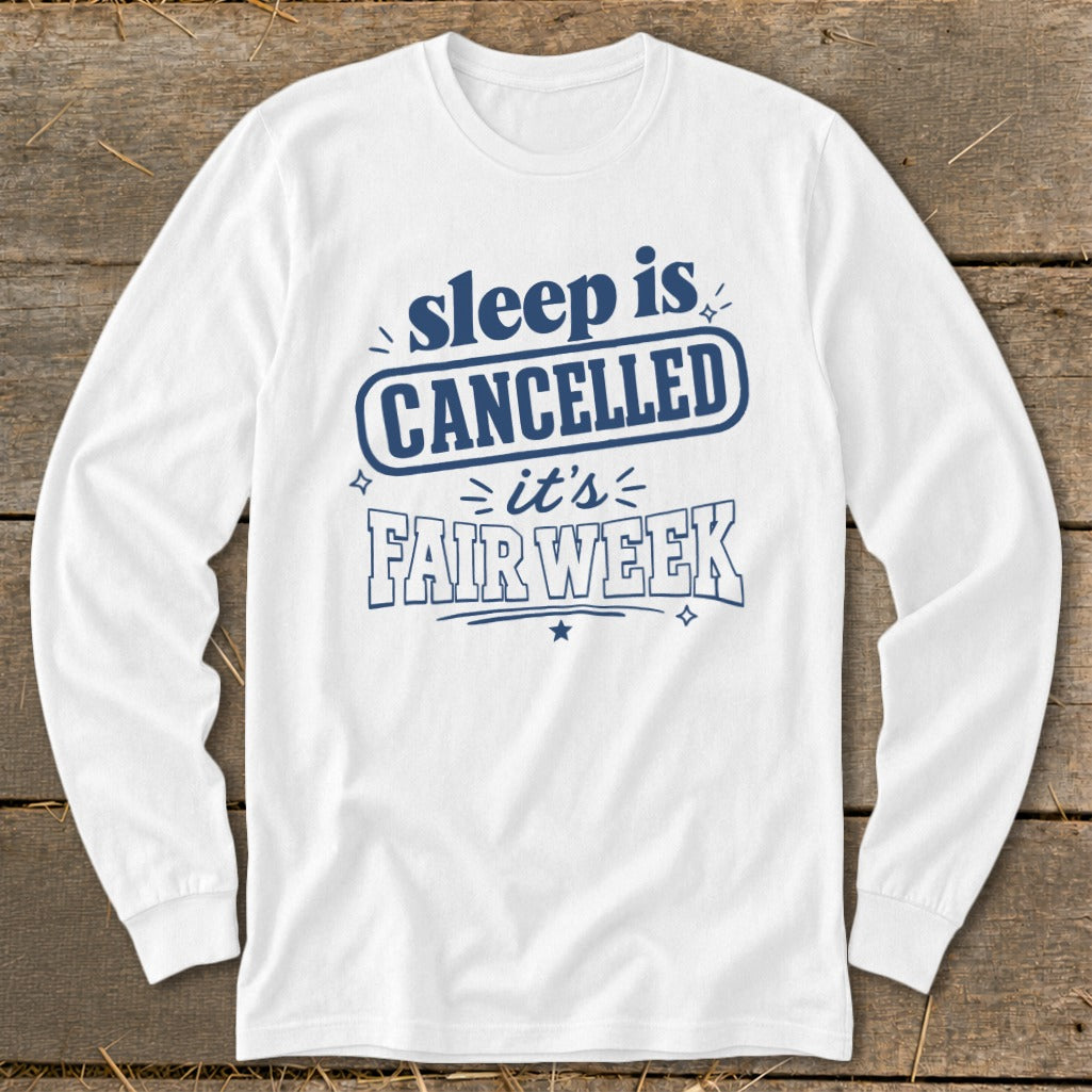 White long-sleeve shirt with "sleep is CANCELLED it's FAIR WEEK" graphic.