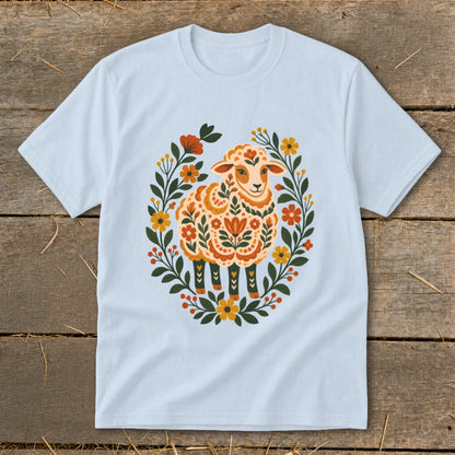 Light blue t-shirt with a floral folk art sheep design.