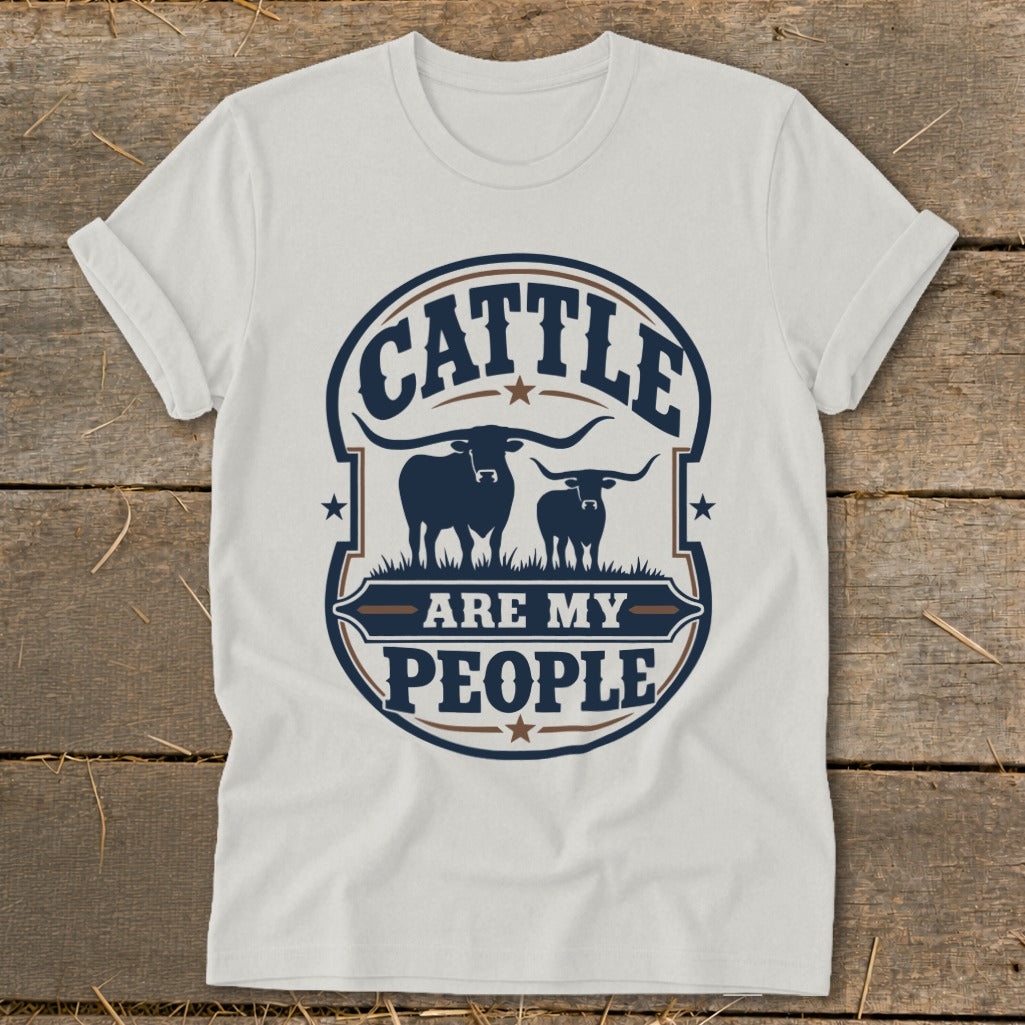 White t-shirt with a circular graphic featuring cattle and text that reads "CATTLE ARE MY PEOPLE".