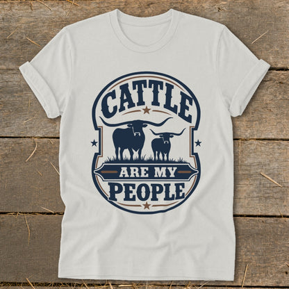 White t-shirt with a circular graphic featuring cattle and text that reads "CATTLE ARE MY PEOPLE".