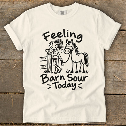 Cream t-shirt with "Feeling Barn Sour Today" text and cartoon girl with horse.