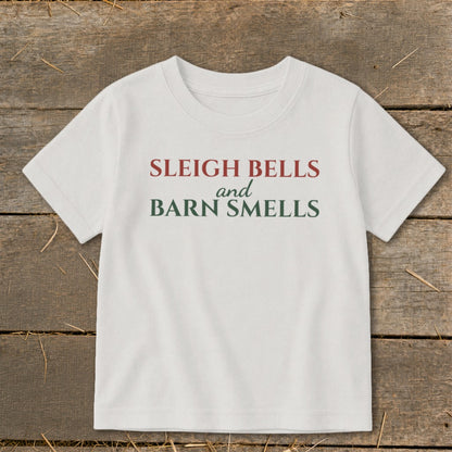 White t-shirt with text "SLEIGH BELLS and BARN SMELLS".