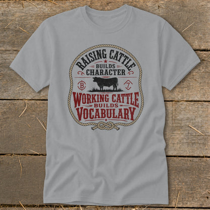 Gray t-shirt with "Raising Cattle Builds Character" and "Working Cattle Builds Vocabulary" text.