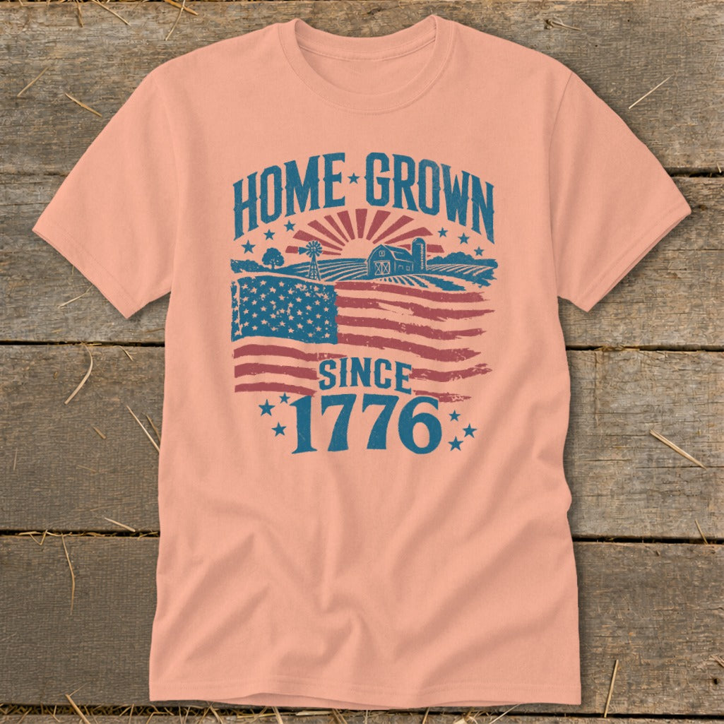 Peach t-shirt with "HOME GROWN SINCE 1776" text and American flag farm scene.