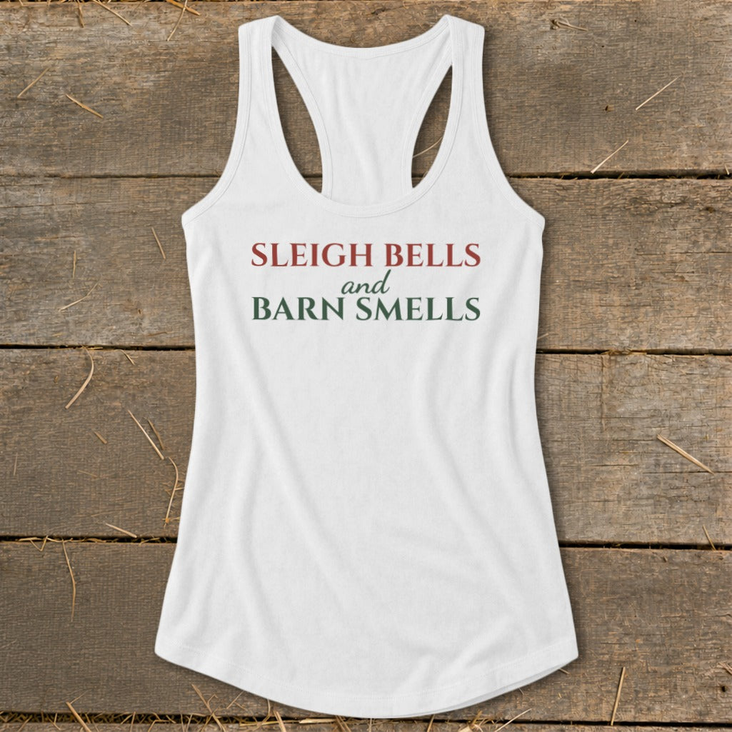 White tank top with "Sleigh Bells and Barn Smells" text in red and green.
