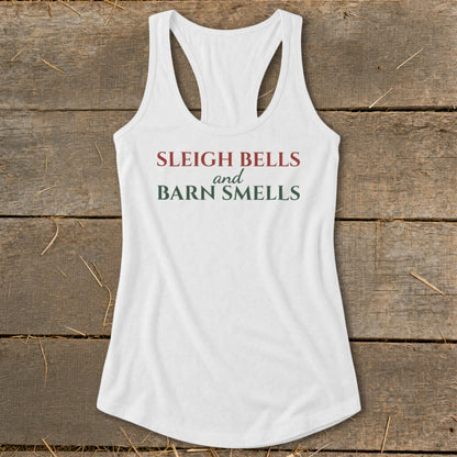 White tank top with "Sleigh Bells and Barn Smells" text in red and green.