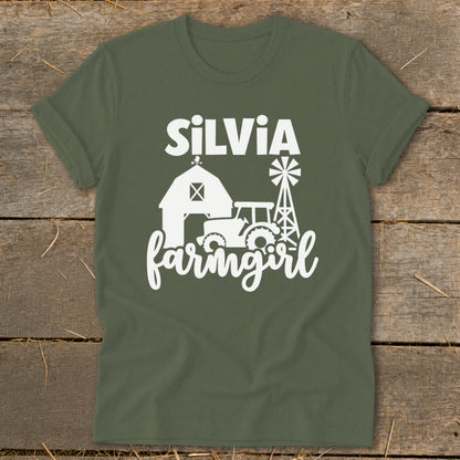 Green t-shirt with "Silvia Farmgirl" text and farm graphics.