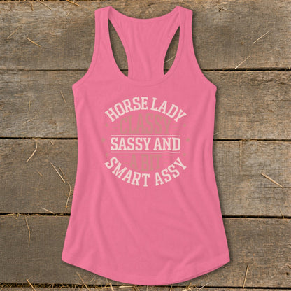 Pink racerback tank top with "Horse Lady Sassy and Smart Ass" text.