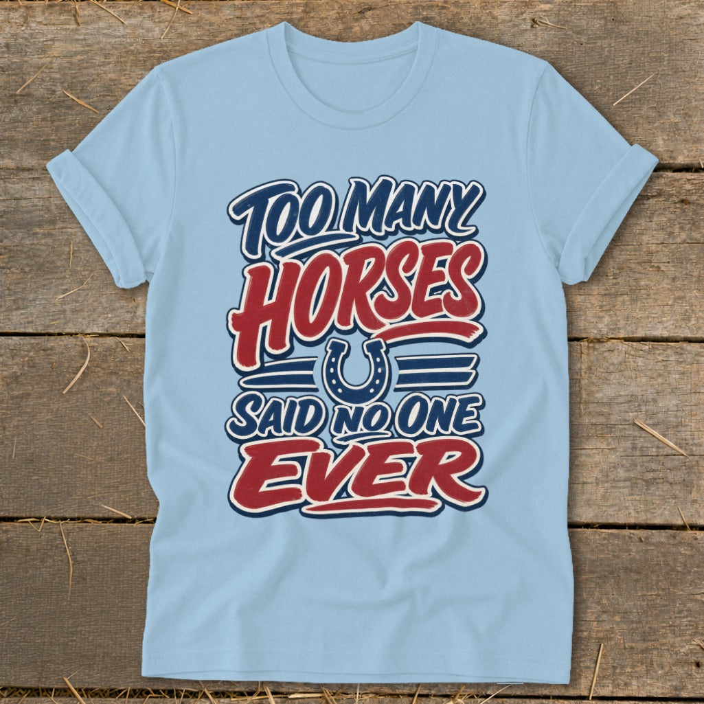 Light blue t-shirt with text "Too Many Horses Said No One Ever" and a horseshoe.