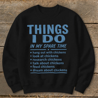 Black sweatshirt with "Things I Do In My Spare Time" and chicken-related activities listed.