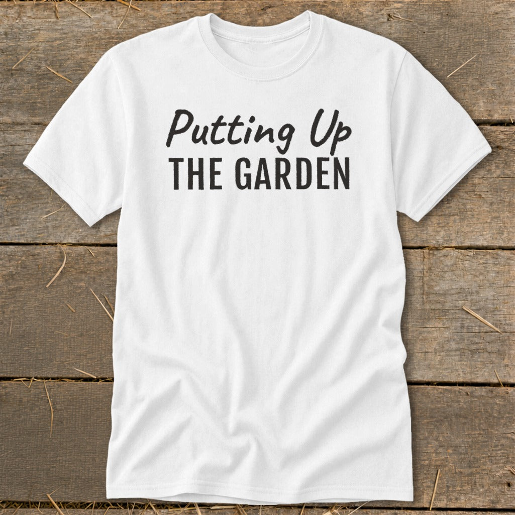 White t-shirt with black text reading "Putting Up THE GARDEN".
