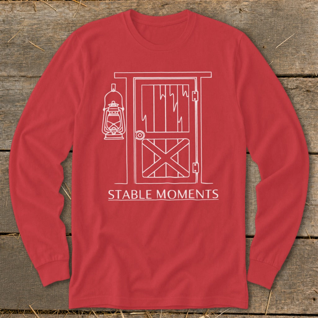 Red long-sleeved shirt with a white line drawing of a barn door and lantern.