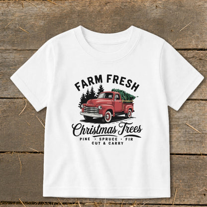 White t-shirt with "Farm Fresh Christmas Trees" graphic featuring a red truck.