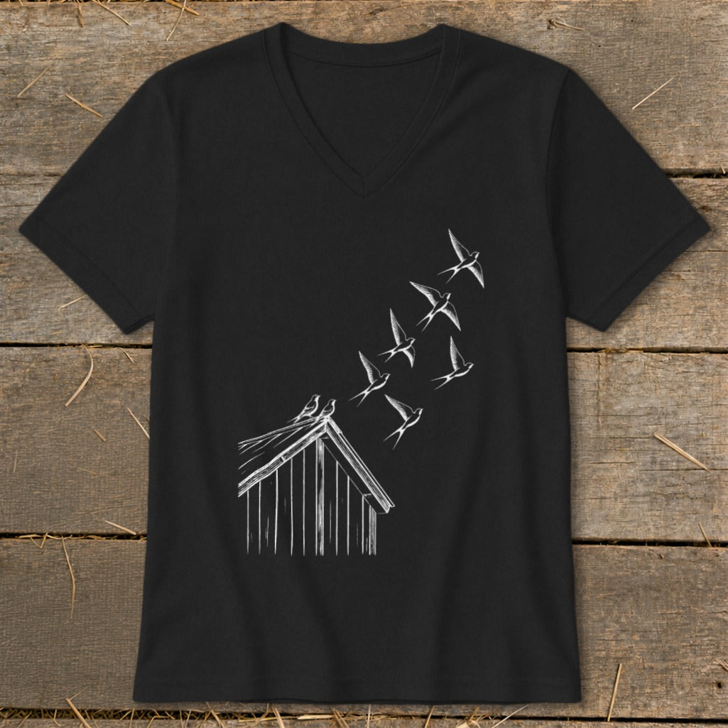 Black V-neck t-shirt featuring a white line graphic of birds flying up from a barn roof.