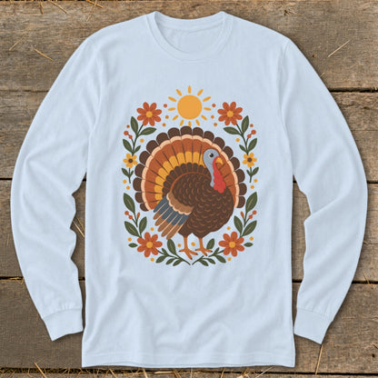 Light blue long-sleeved shirt with a colorful turkey and floral design.