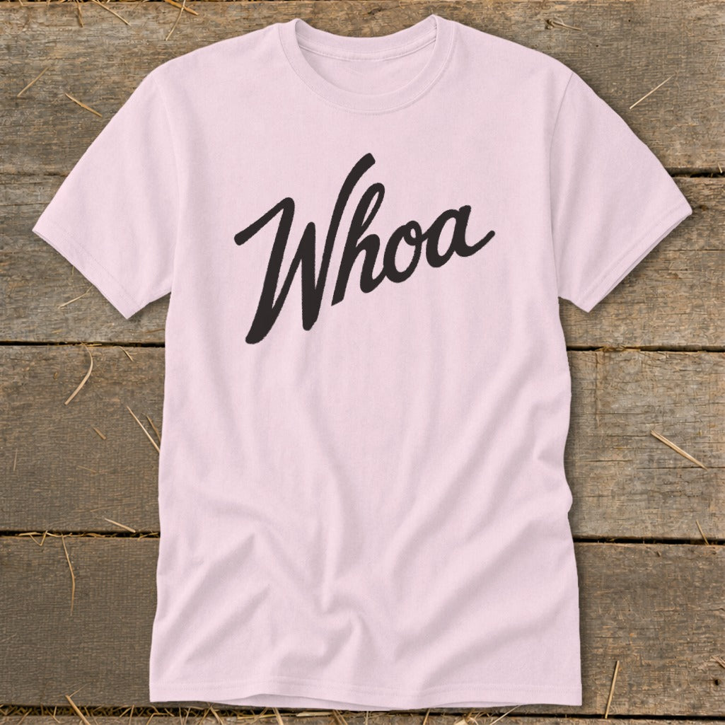 Pink t-shirt with "Whoa" in black cursive lettering.