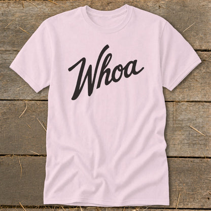 Pink t-shirt with "Whoa" in black cursive lettering.