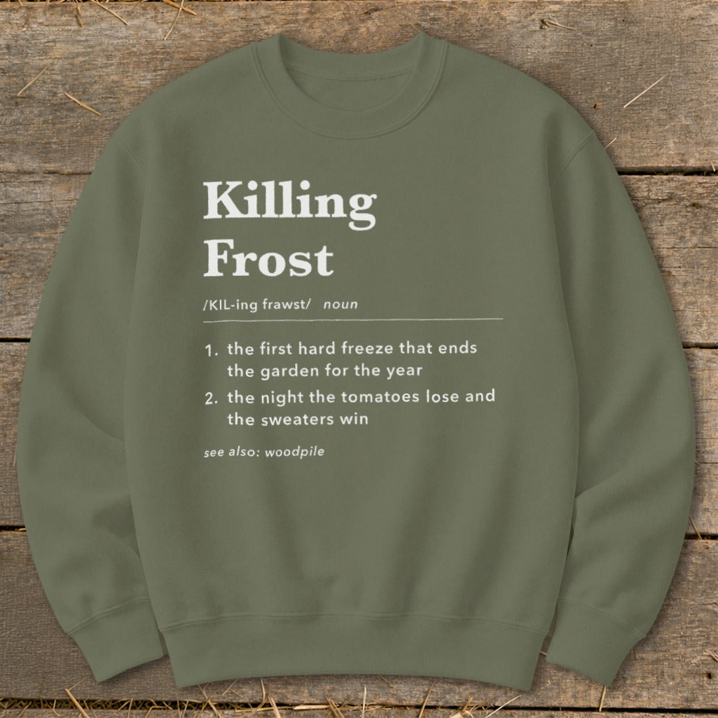 An olive green crewneck sweatshirt featuring a dictionary definition graphic for Killing Frost in white text.