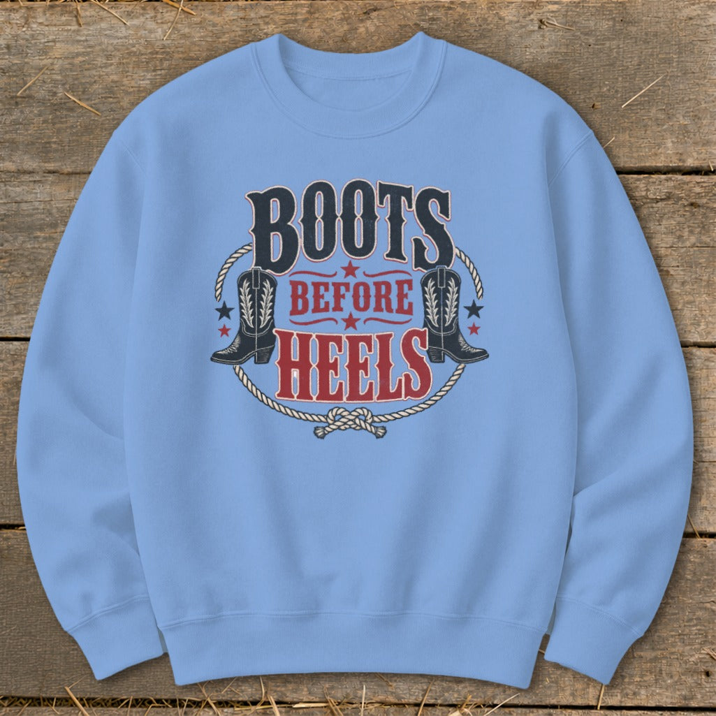 Light blue sweatshirt with "Boots Before Heels" graphic and cowboy boots.