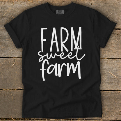 Black t-shirt with "FARM sweet farm" in white cursive font.