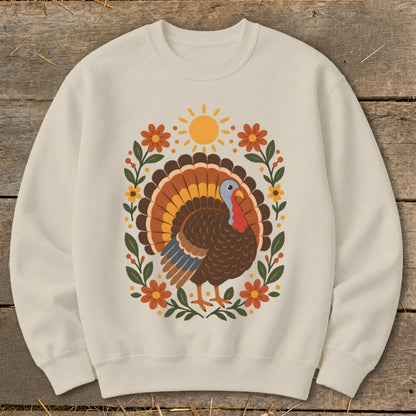 Cream sweatshirt with a graphic of a turkey and floral border.