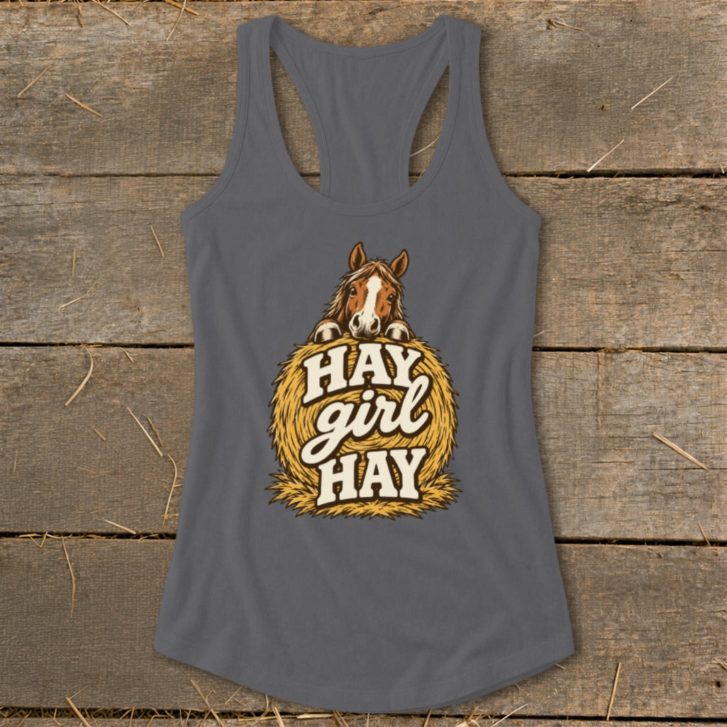 Horse peeking over a hay bale with "Hay Girl Hay" text.