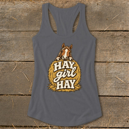 Horse peeking over a hay bale with "Hay Girl Hay" text.