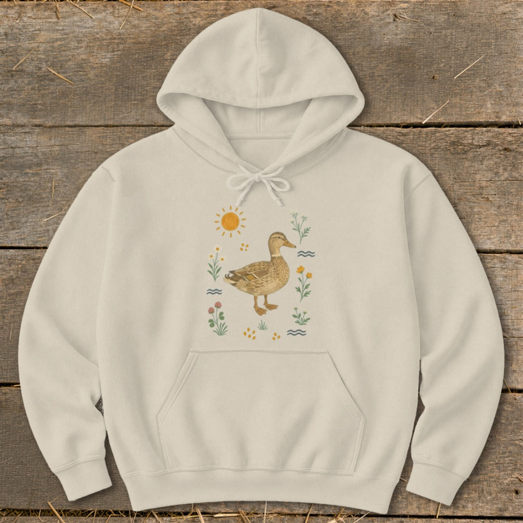 Cream hoodie with a stylized mallard duck and floral graphic.