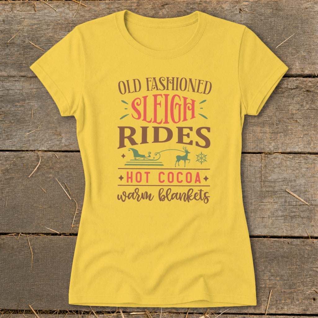 Yellow t-shirt with "Old Fashioned Sleigh Rides, Hot Cocoa, Warm Blankets" text and graphics.