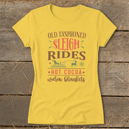 Yellow t-shirt with "Old Fashioned Sleigh Rides, Hot Cocoa, Warm Blankets" text and graphics.