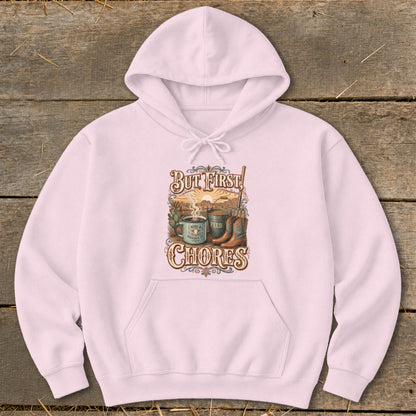 Pink hoodie with "But First, Chores" graphic featuring coffee, feed, and cowboy boots.
