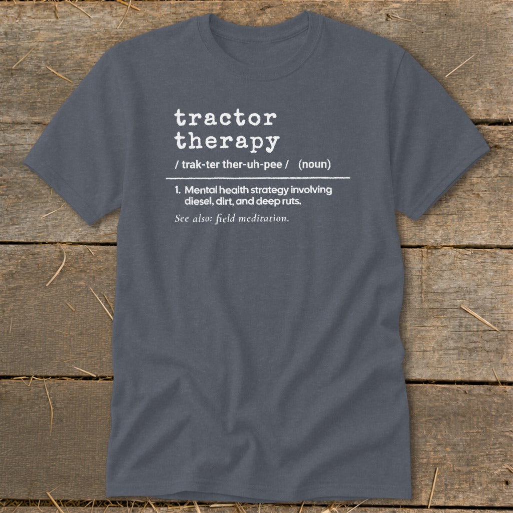 Gray t-shirt with white text defining "tractor therapy" as a mental health strategy.