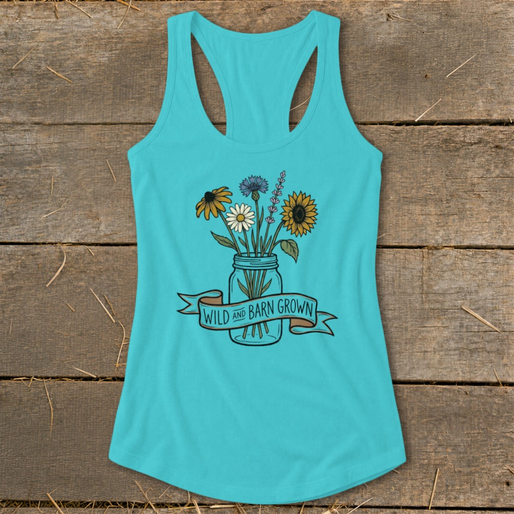 Turquoise tank top with a mason jar bouquet and "Wild and Barn Grown" banner graphic.