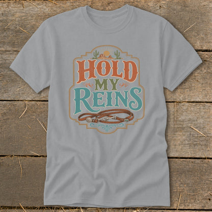 Gray t-shirt with "HOLD MY REINS" text and horse reins graphic.
