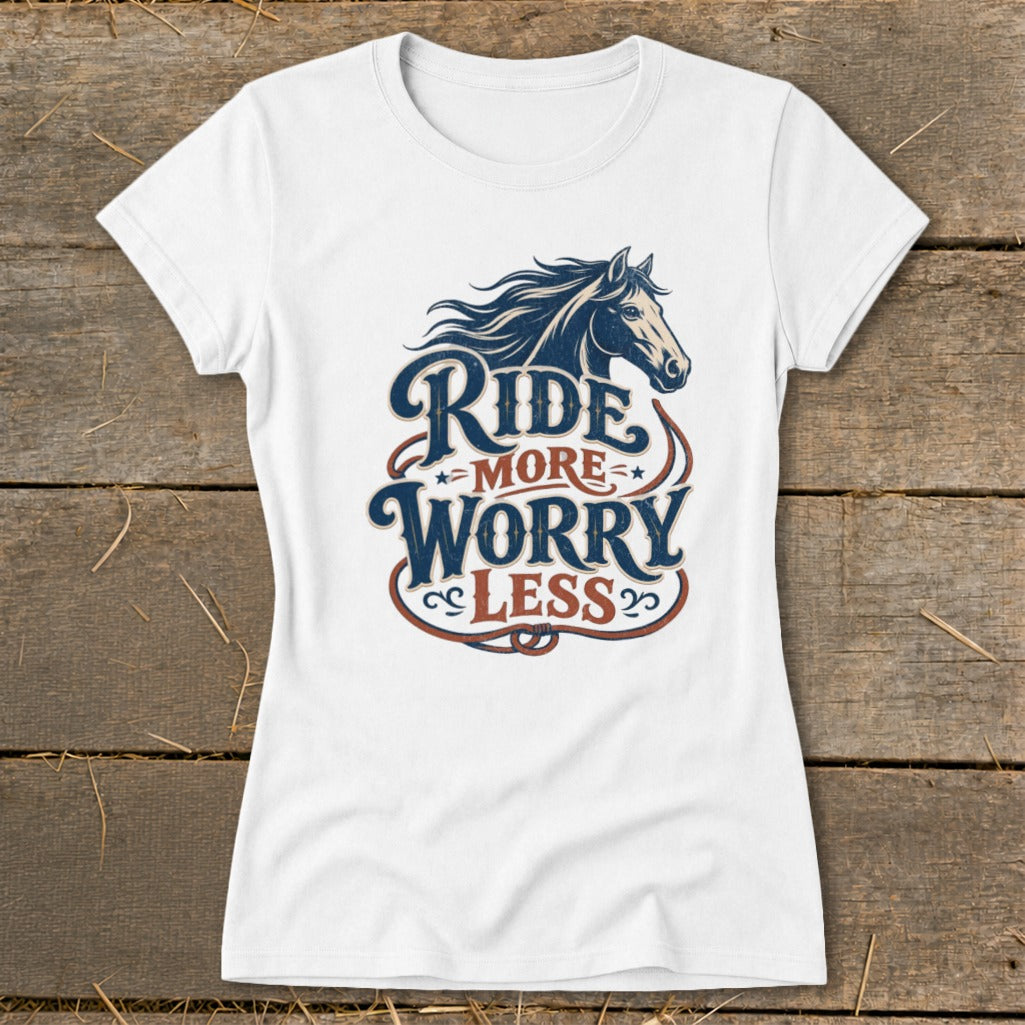 White t-shirt with horse graphic and text "Ride More Worry Less".