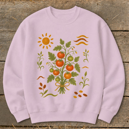 Pink sweatshirt with a whimsical tomato plant, sun, and wavy lines design.