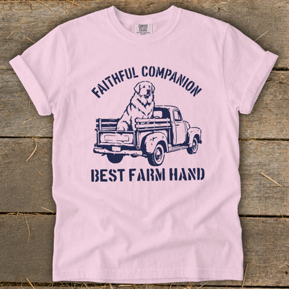 Pink t-shirt with navy graphic of a dog in a truck, "Faithful Companion" and "Best Farm Hand".