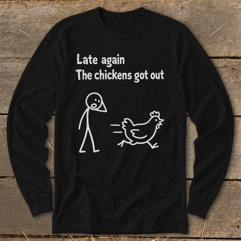 Black long sleeve shirt with white text and cartoon of person chasing chicken.