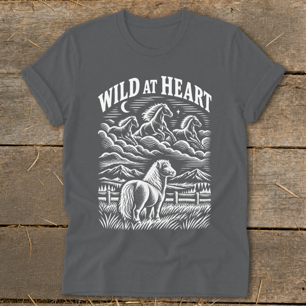 Gray t-shirt with "Wild at Heart" text and a graphic of horses running above mountains and a pony.